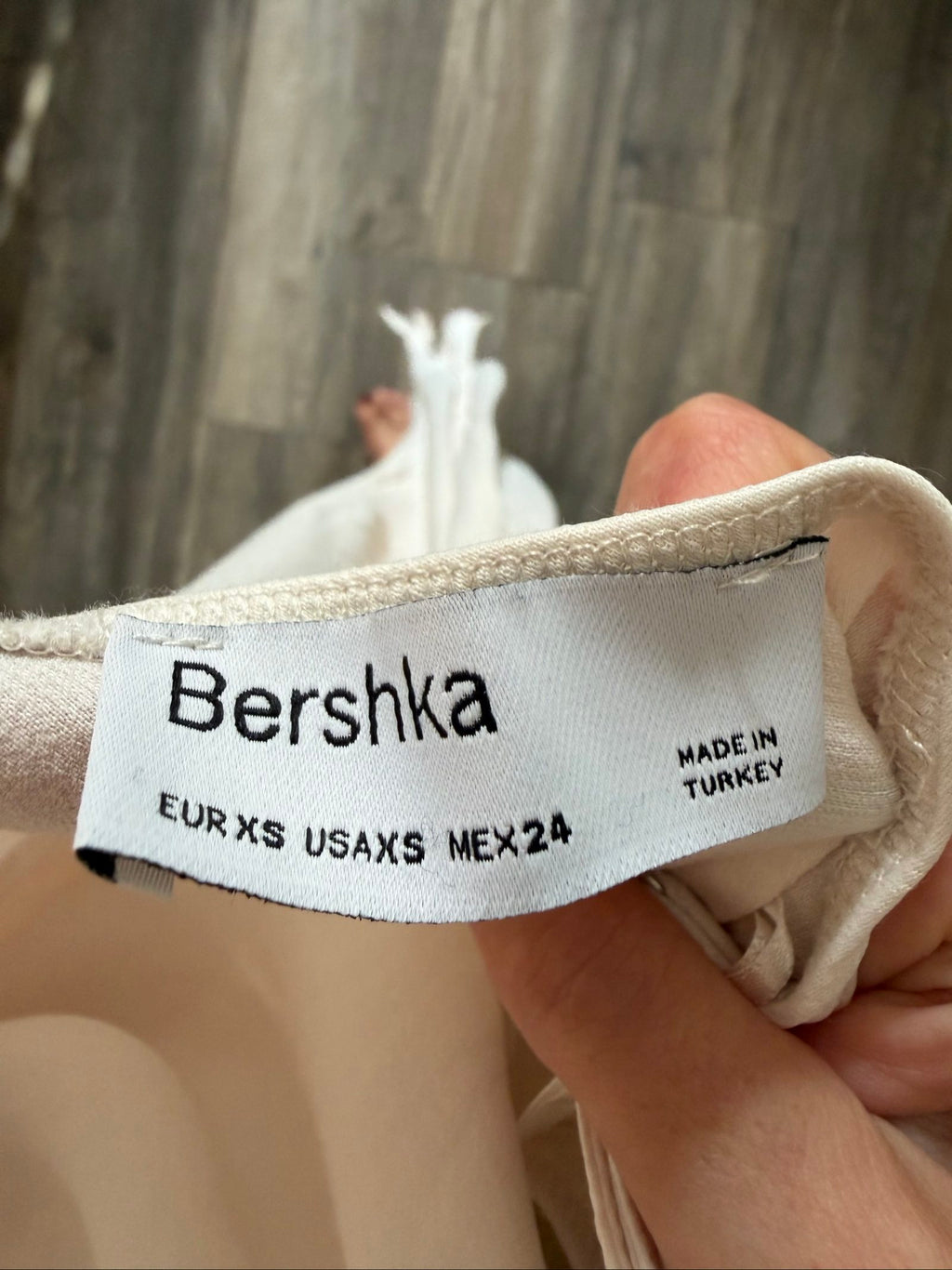 Bershka beige slip dress with thin straps and lightweight 100% viscose material.
