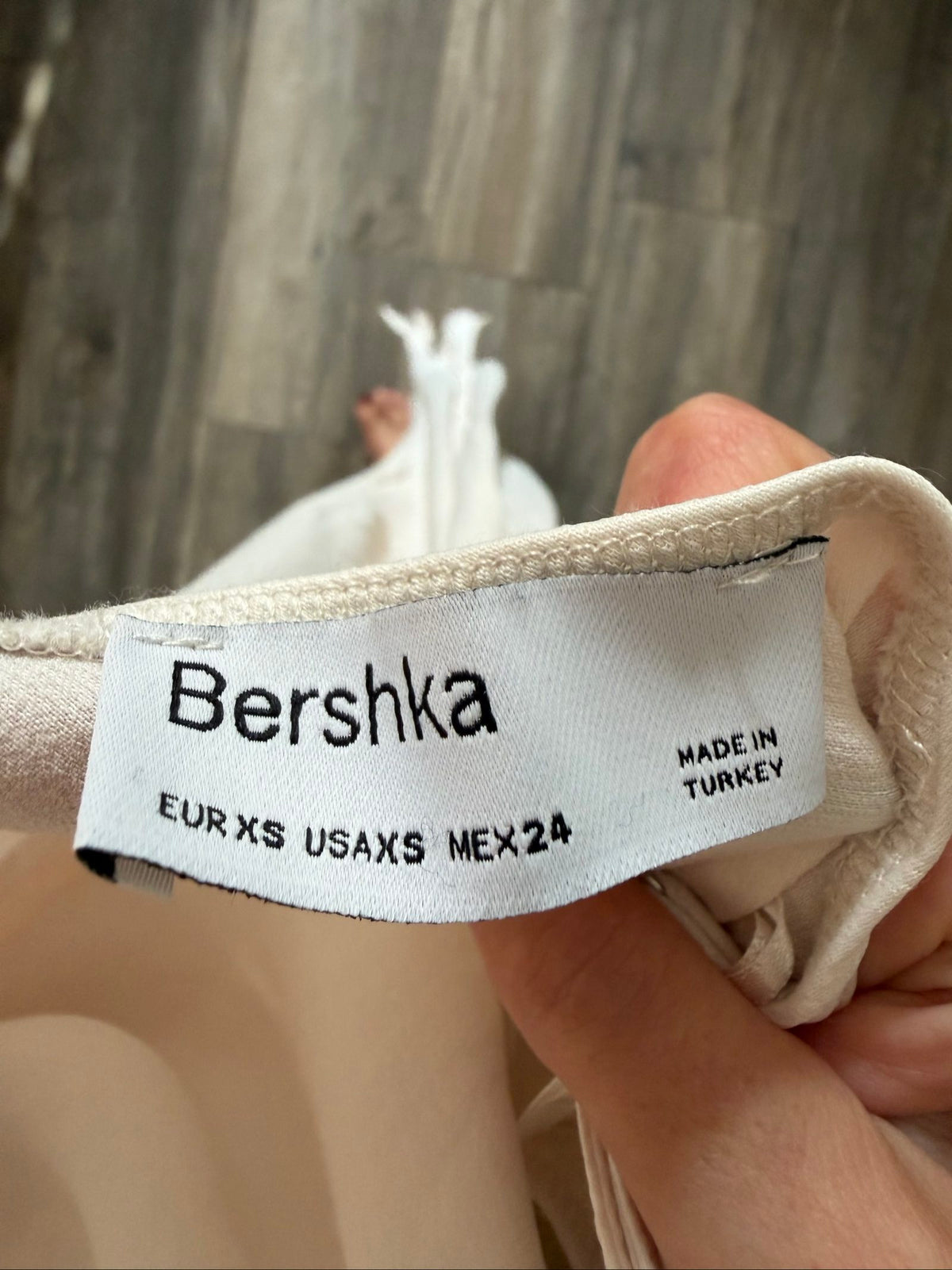 Bershka beige slip dress with thin straps and lightweight 100% viscose material.