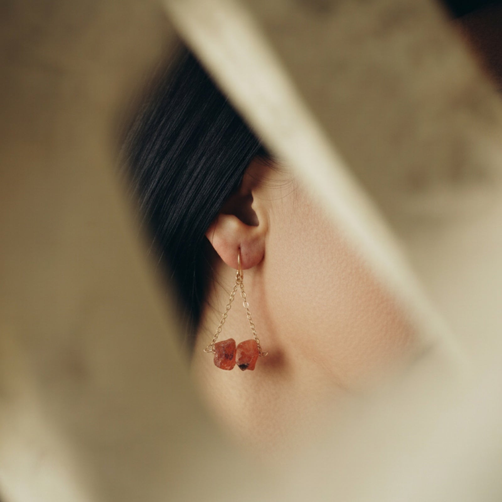 Nia Vintage Boutique gold drop earrings with red agathe stones and 18k gold plated chains.