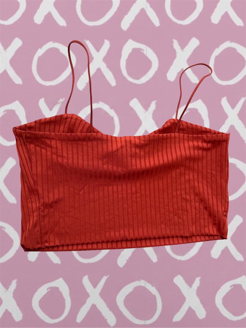 Rust ribbed crop top orange with spaghetti straps and textured fabric.