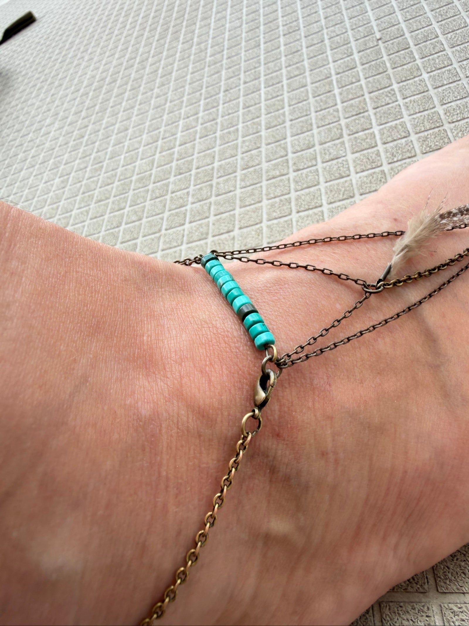 Festival boho foot jewelry turquoise beads brass chain feather charm earthy style