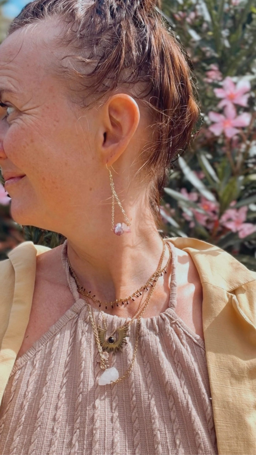 Nia Vintage Boutique gold earrings with rainbow tourmaline accents and boho chain design.